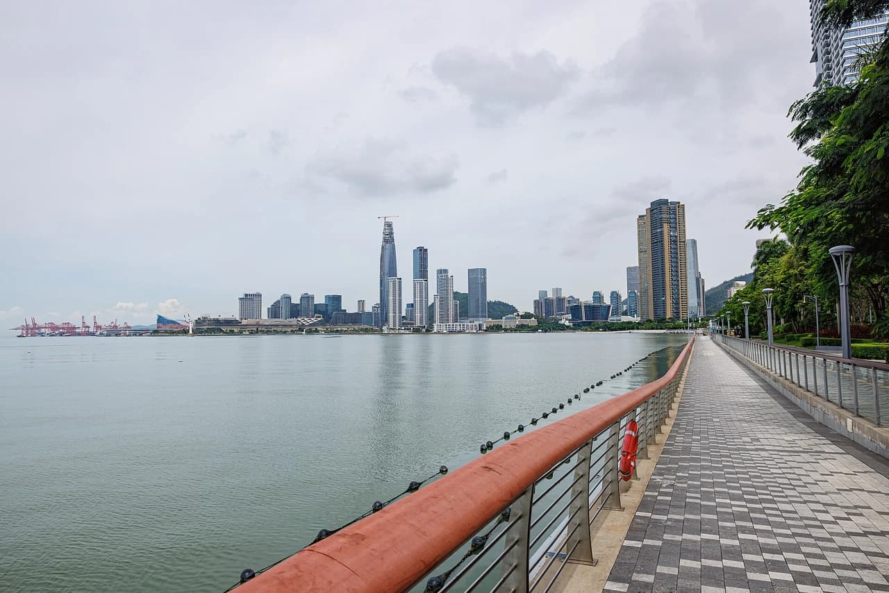 The boardwalk along Deep Bay, with the city across the water