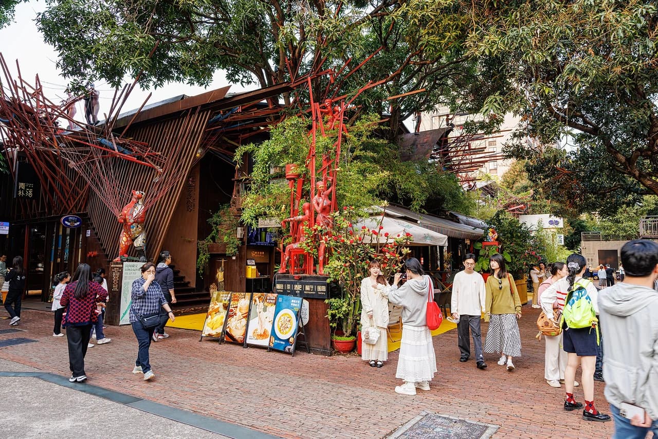 Weekend market stalls under the trees